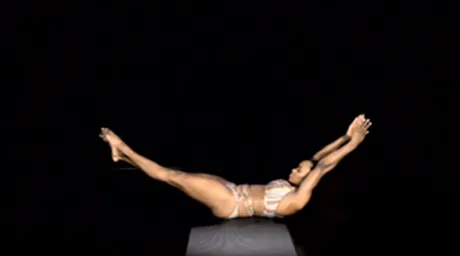 Conditioning exercise without a pole  like hollow body roll helps pole dances increase strength and control on the pole. 