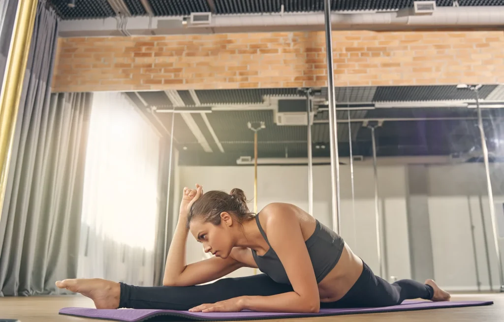 beginner pole dance tips: stretch before practicing