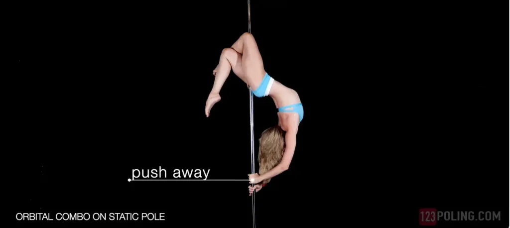 Instructional screenshot with a cue labeled “push away” during a strength-based move on a vertical pole
